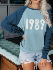 1989 Graphic Contrast Color Raglan Sweatshirt